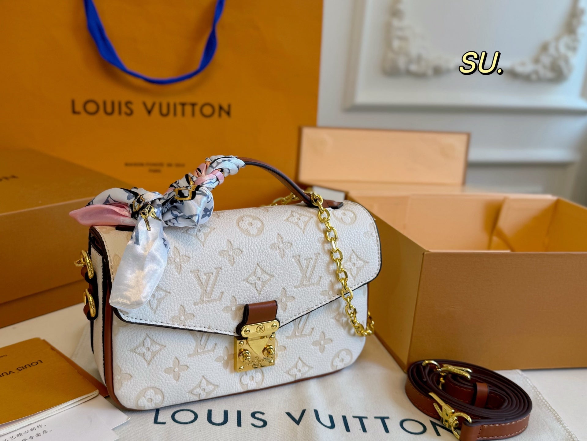 LV Embossed Messenger Bag