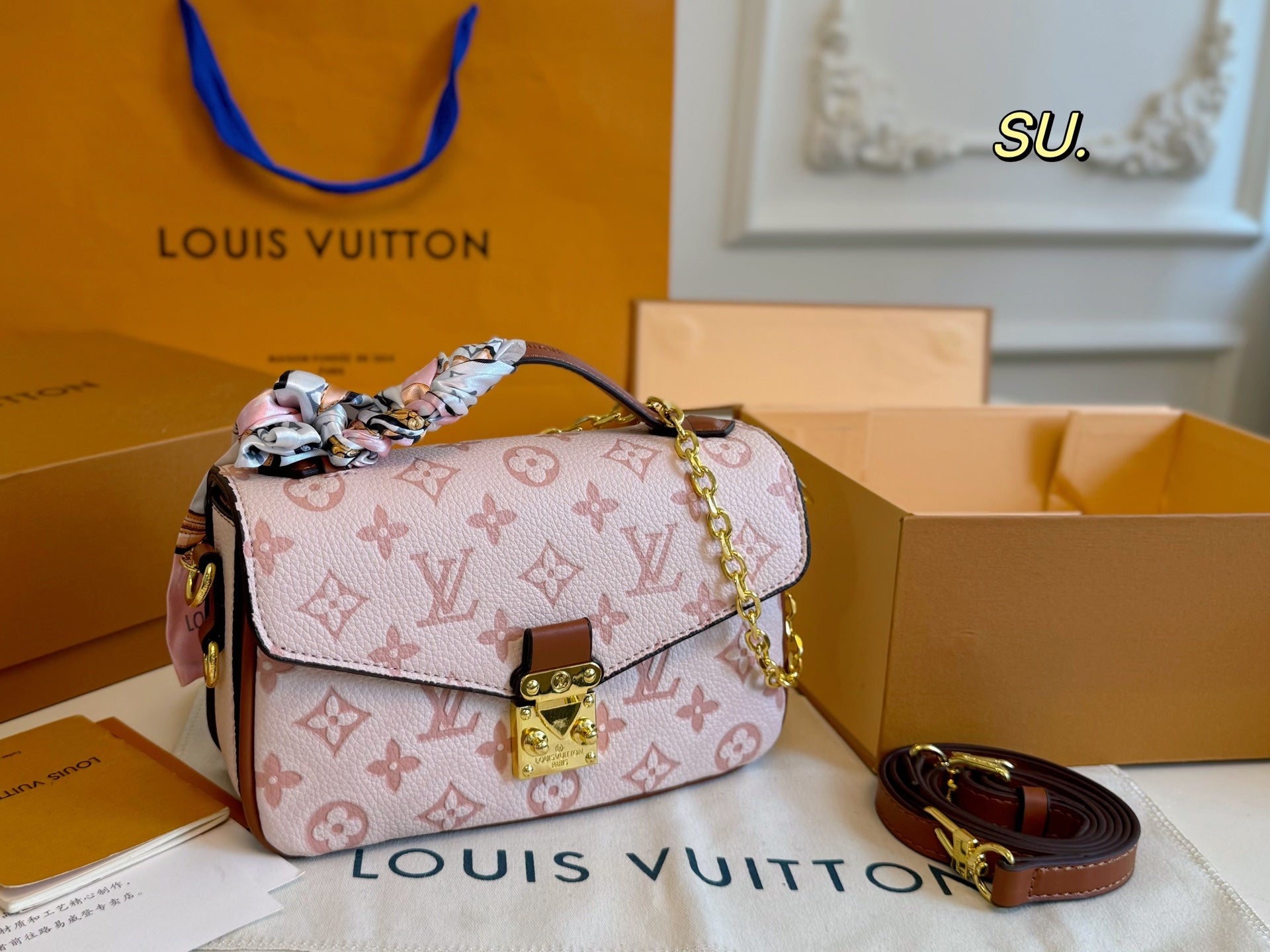 LV Embossed Messenger Bag