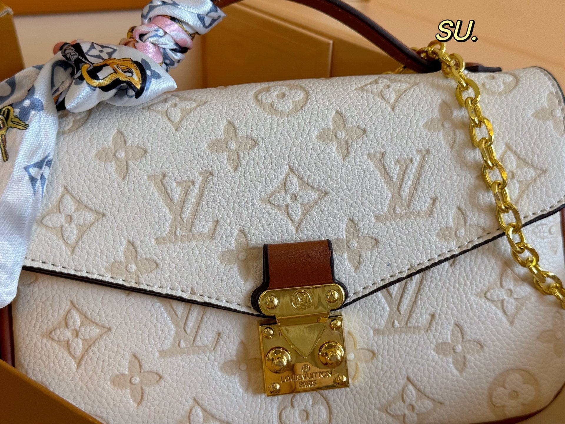 LV Embossed Messenger Bag