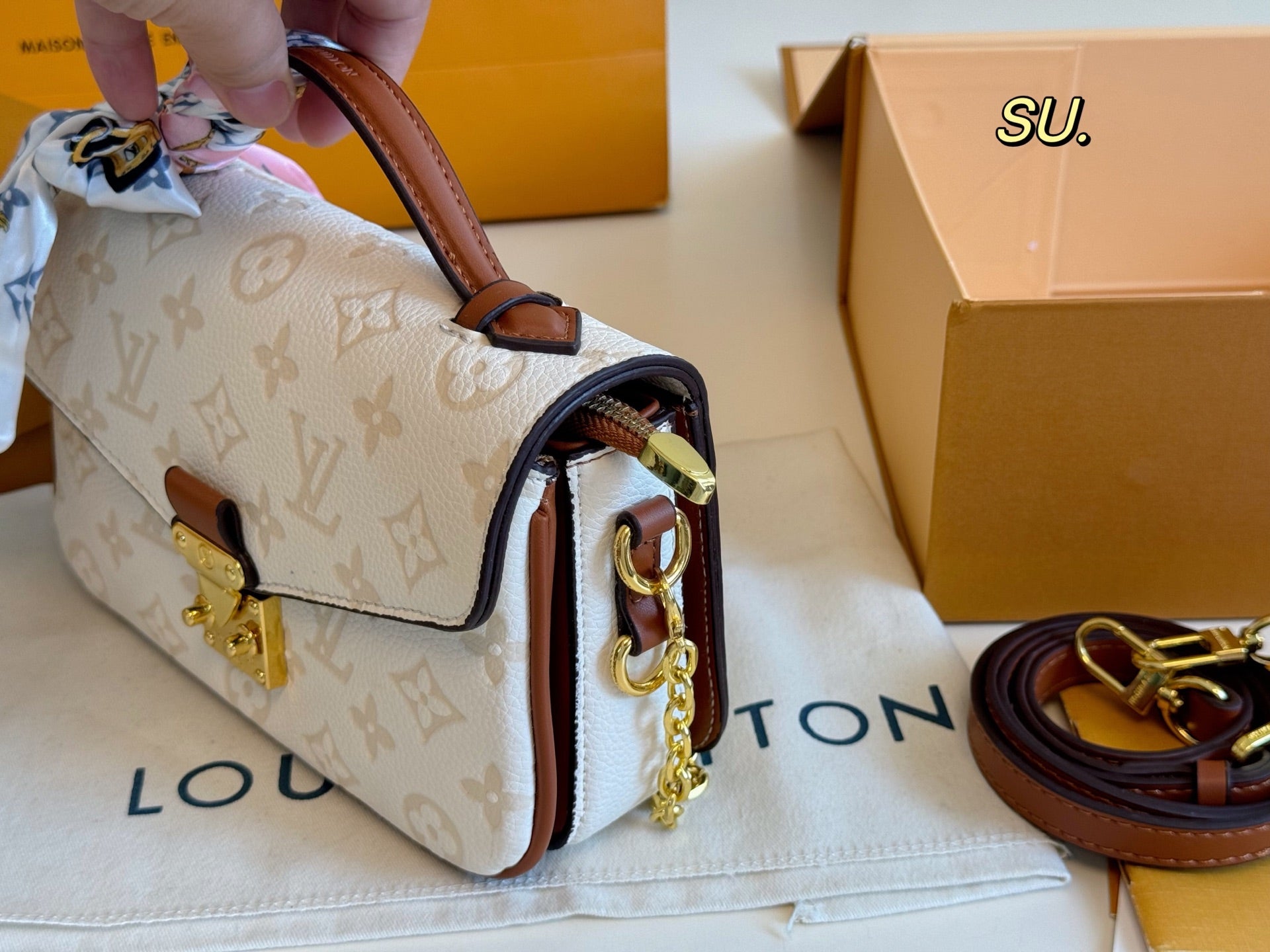 LV Embossed Messenger Bag