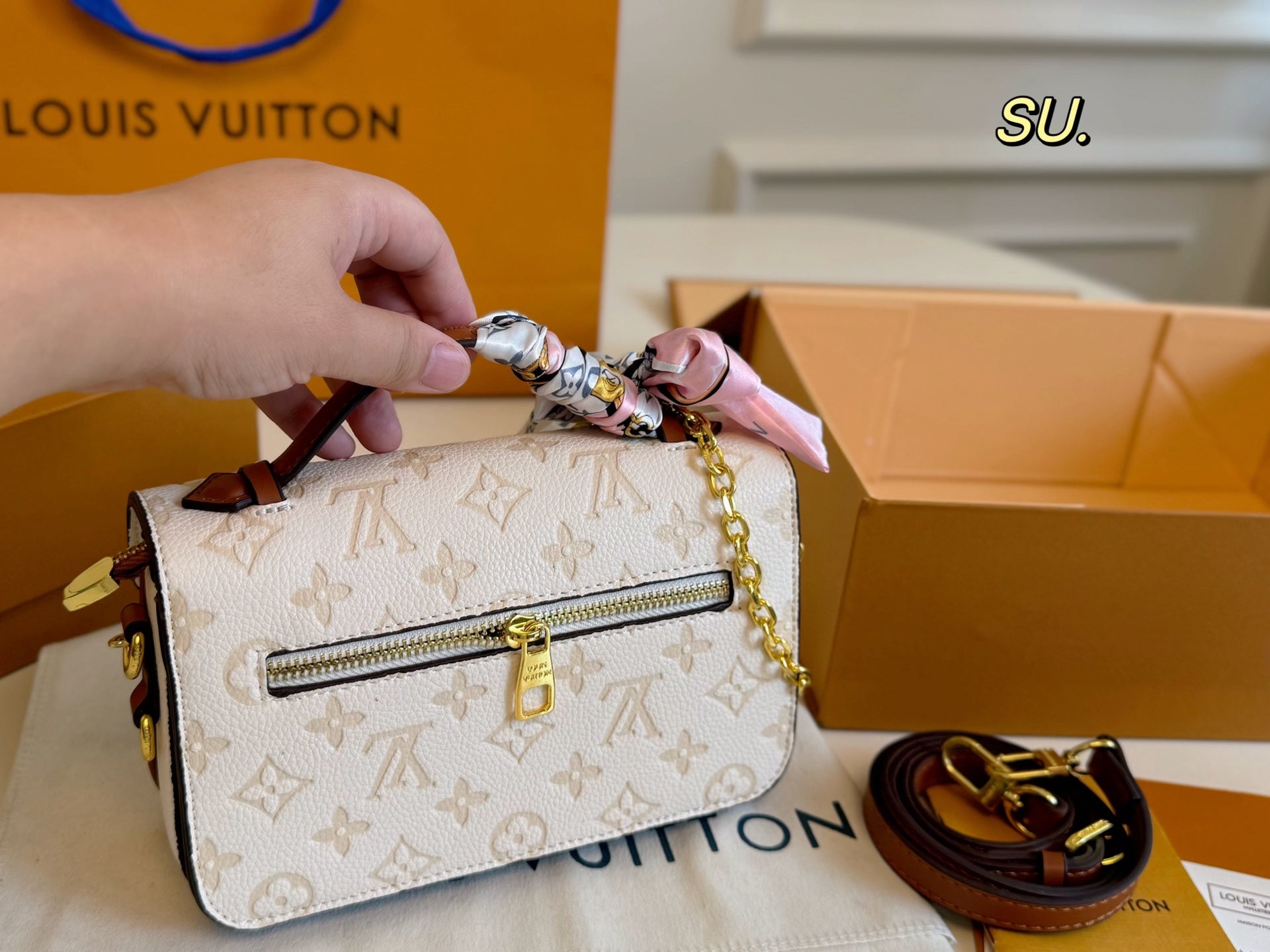 LV Embossed Messenger Bag