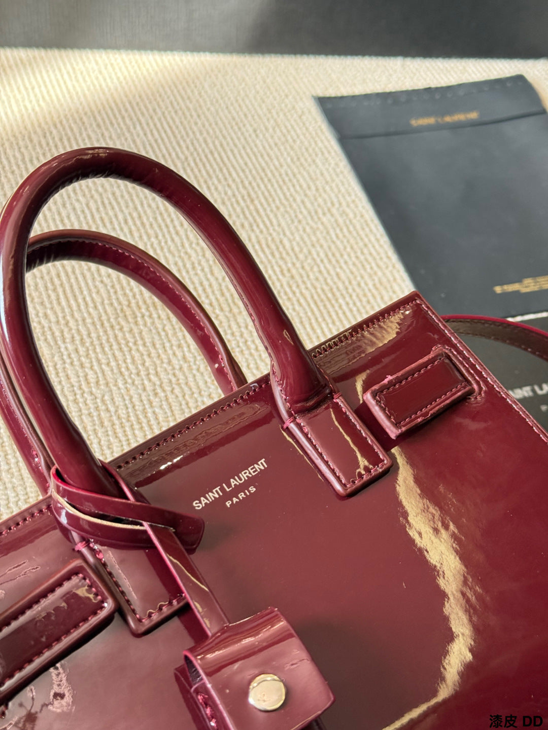 YSL Sac de Jour Patent leather accordion bag