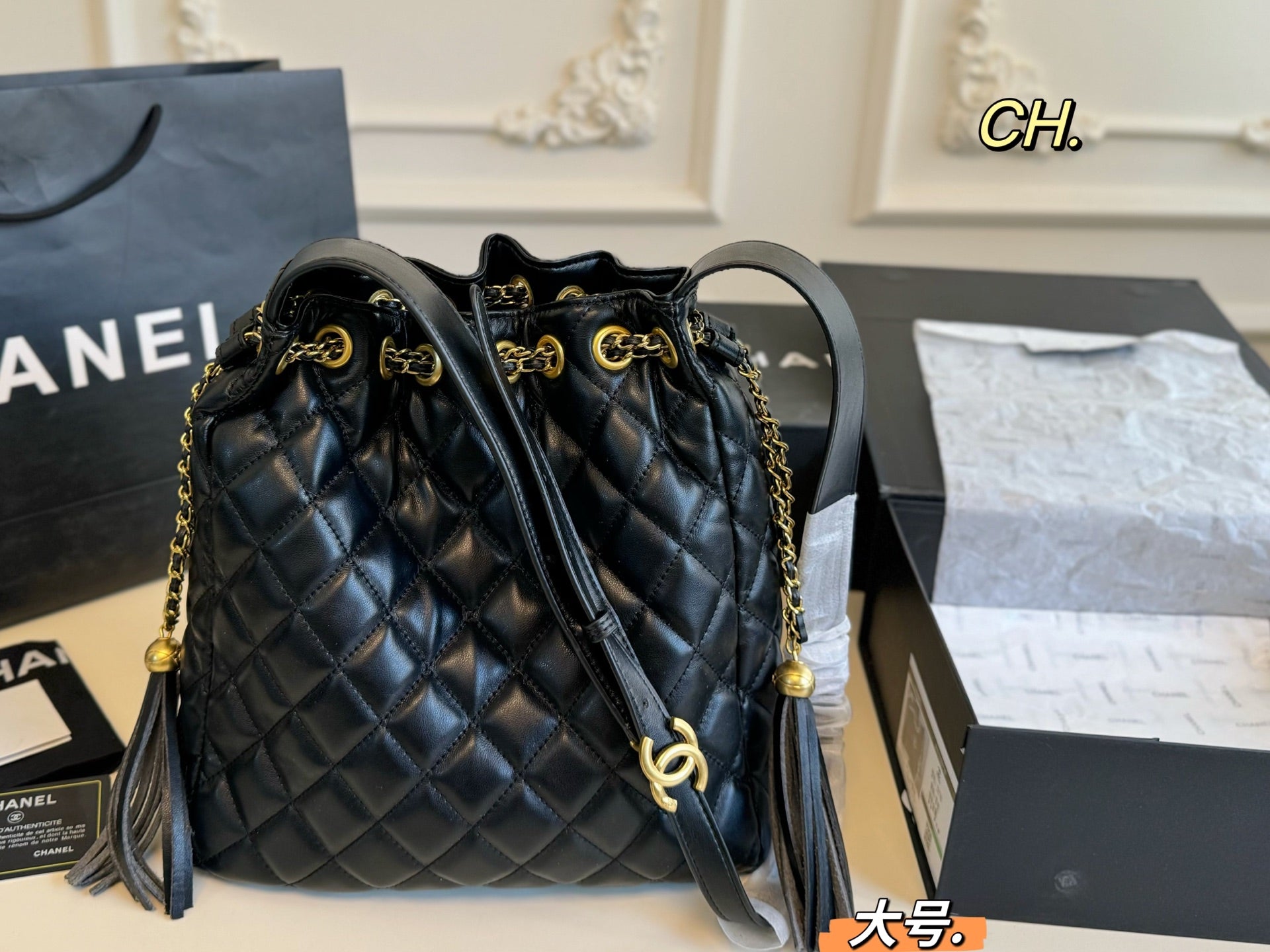 Chanel 25a Tassel Chain Bucket Bag