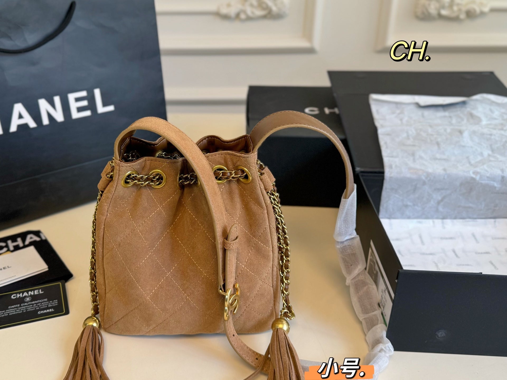 Chanel 25a Tassel Chain Bucket Bag