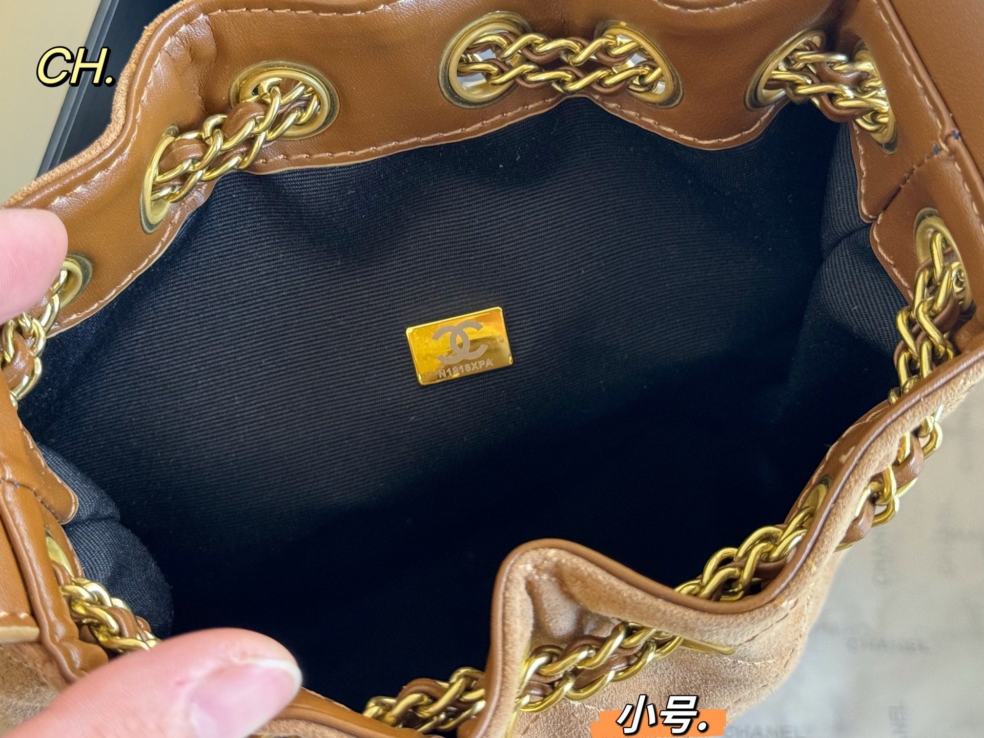 Chanel 25a Tassel Chain Bucket Bag