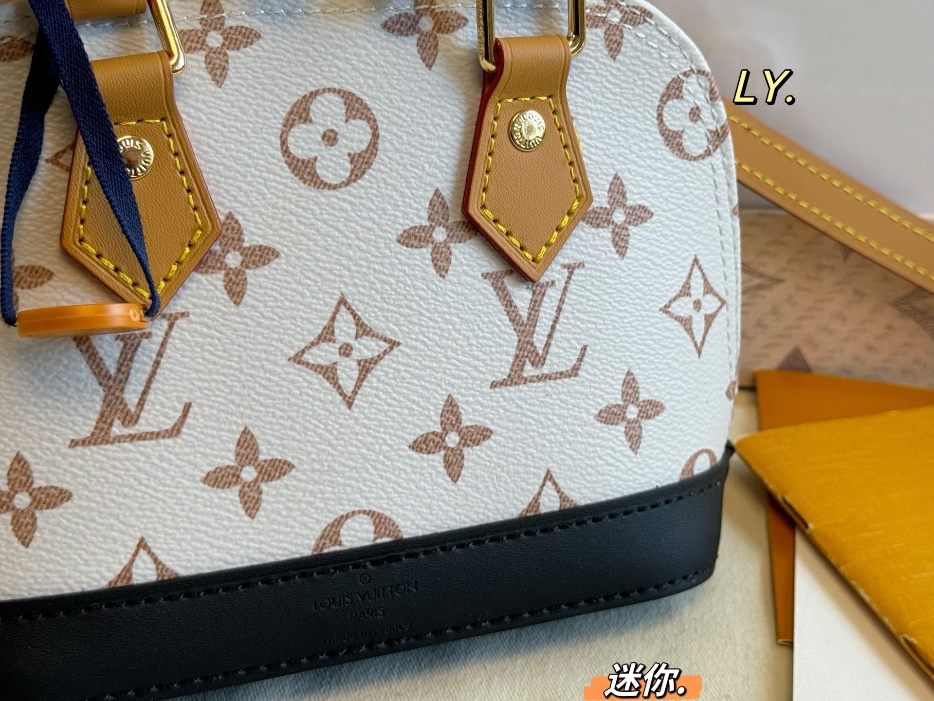 LV nano Alma Shell Bag