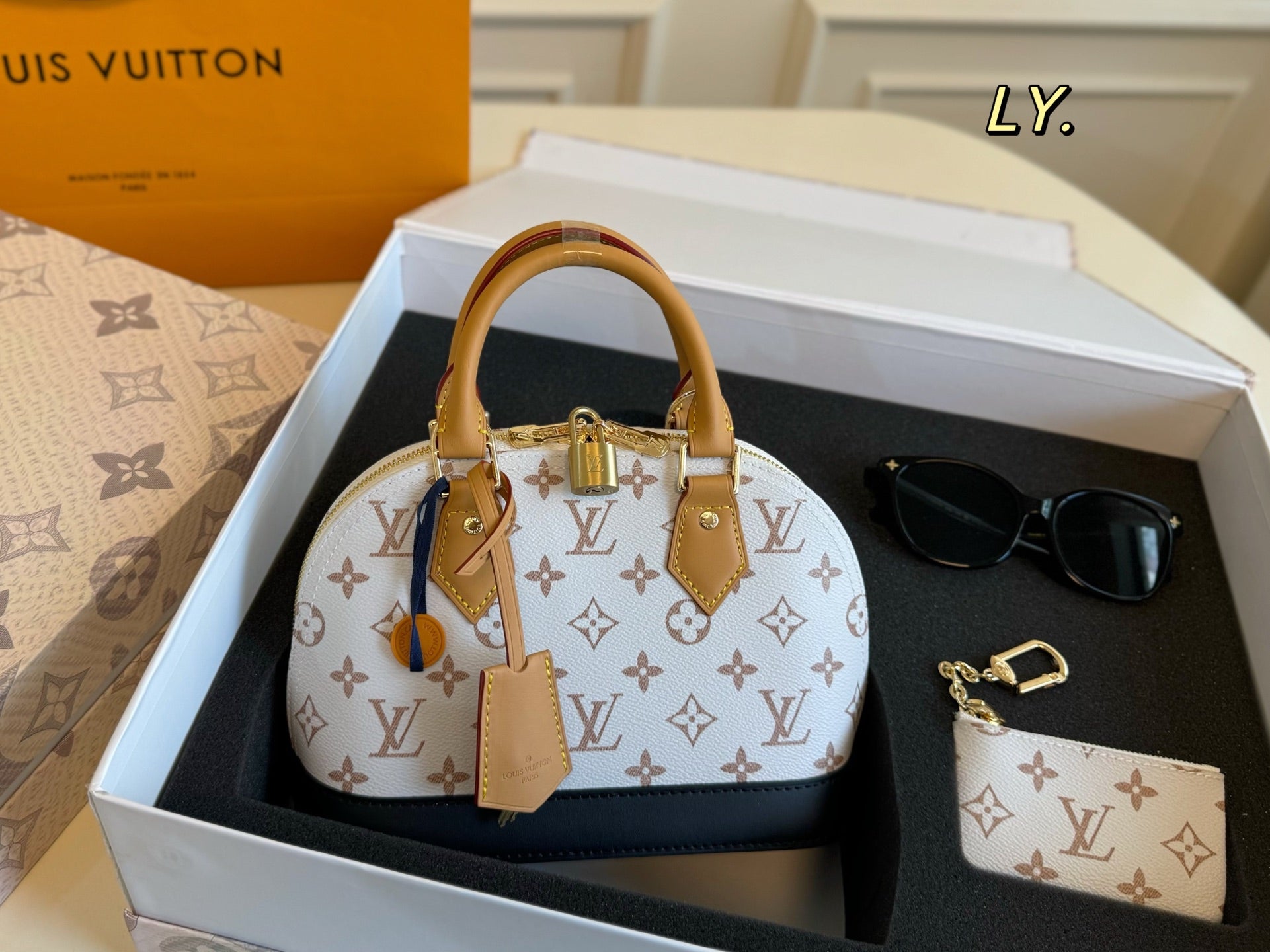LV nano Alma Shell Bag