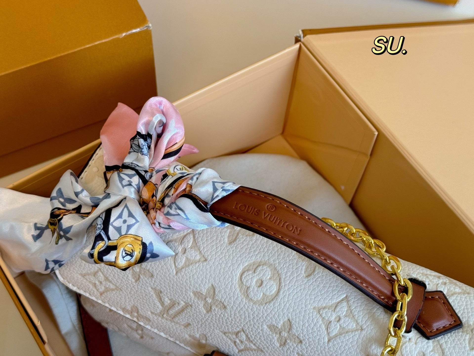 LV Embossed Messenger Bag