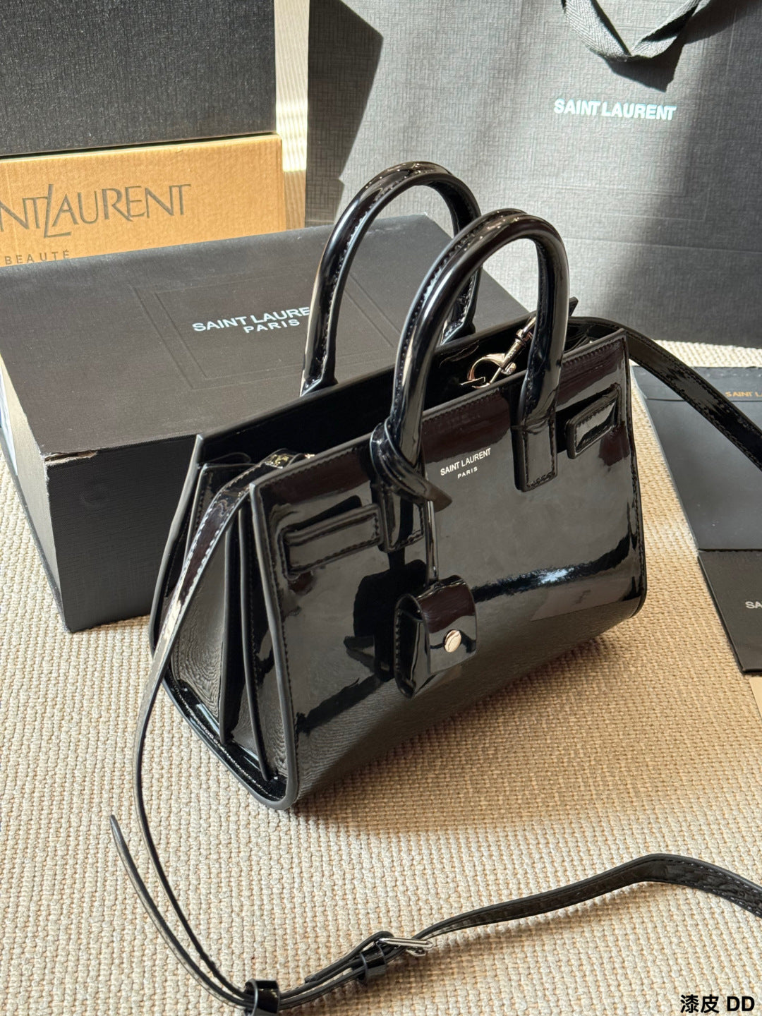 YSL Sac de Jour Patent leather accordion bag