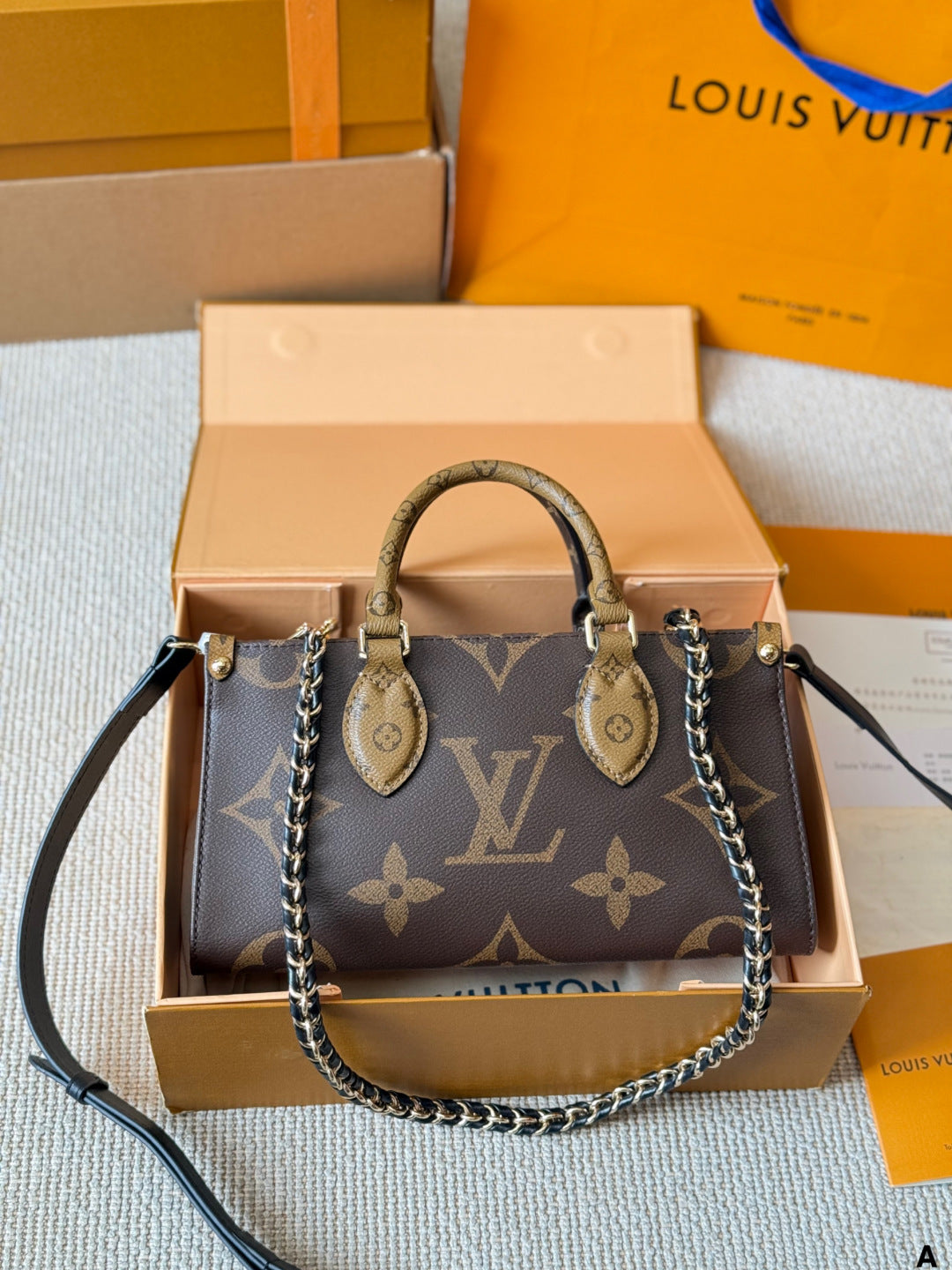 LV On The Go Horizontal Vintage-patterned Bag