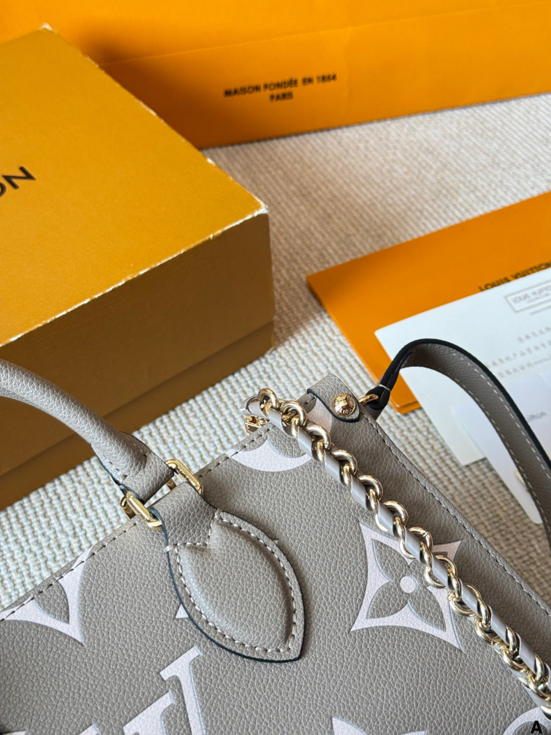 LV On The Go Horizontal Vintage-patterned Bag