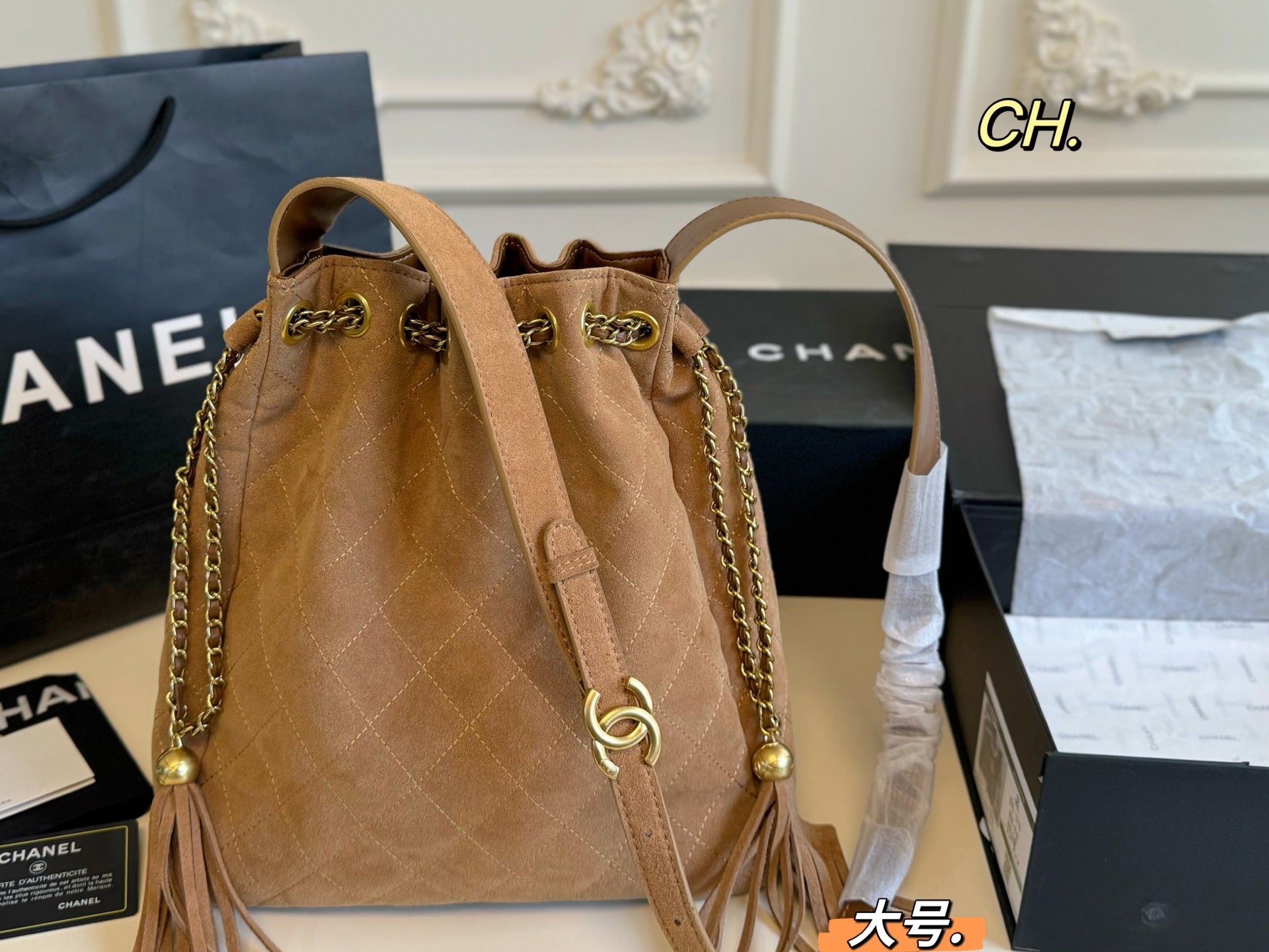 Chanel 25a Tassel Chain Bucket Bag