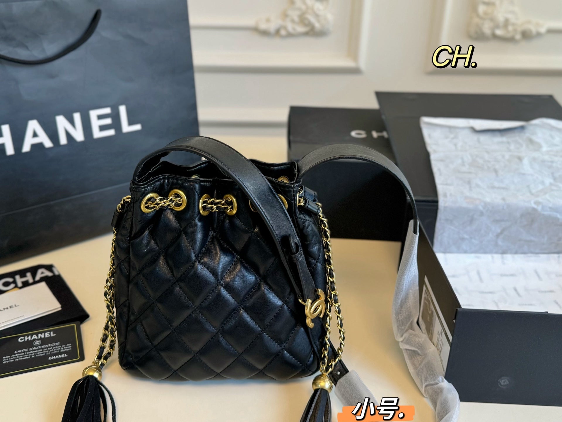Chanel 25a Tassel Chain Bucket Bag