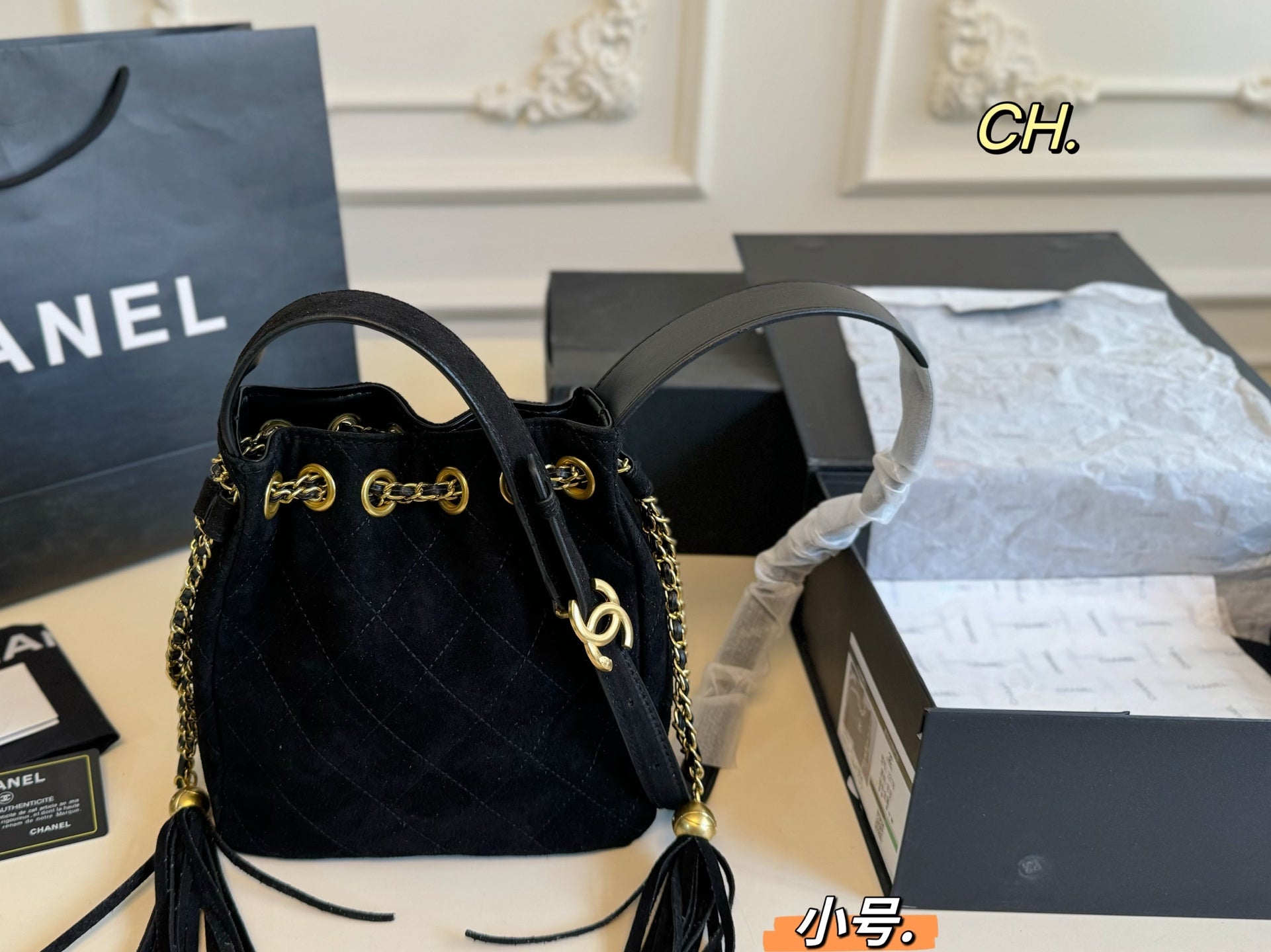 Chanel 25a Tassel Chain Bucket Bag